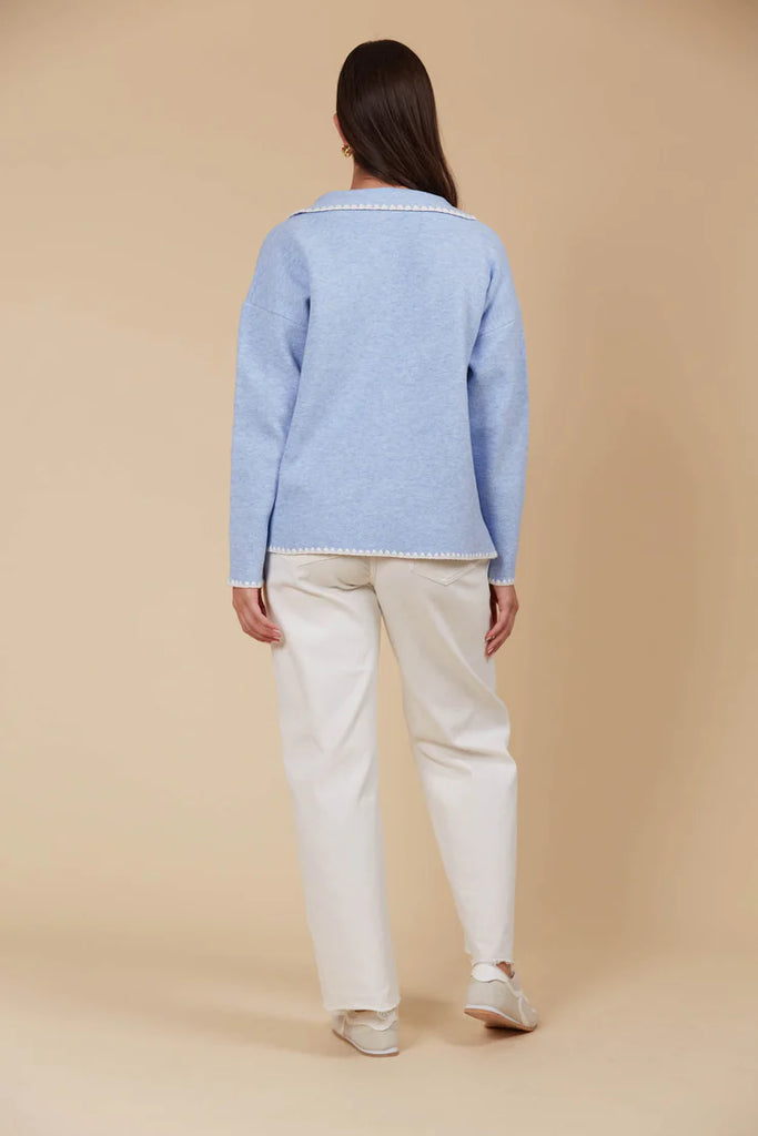 Athena Jumper - Sky-Isle of Mine-The Athena Jumper is bound to be your new go-to for everyday wear. Its relaxed fit makes it super easy to throw on, featuring a classic collar, V-neck, and subtle contrast stitch details for a hint of style. Perfect for grabbing coffee, running errands, or just lounging at home, this cosy wool and recycled blend will keep you warm and comfortable all day. Pair it with loose pants or your favourite jeans and sneakers for an effortlessly laid-back look. Collar V-neck Drop shou