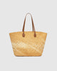 Ava Basket Tote - Natural Raffia-Louenhide-The Ava Natural Raffia Basket Tote is your effortlessly stylish plus-one for sun-drenched days and spontaneous summer moments. Crafted from natural raffia in a structured open-top basket silhouette, she blends relaxed elegance with warm-weather practicality - perfect for everything from seaside escapes to spritz-soaked afternoons in the sun. Her slim, elongated handles in smooth tan vegan leather add a refined contrast and comfortable carry, whether worn over the s