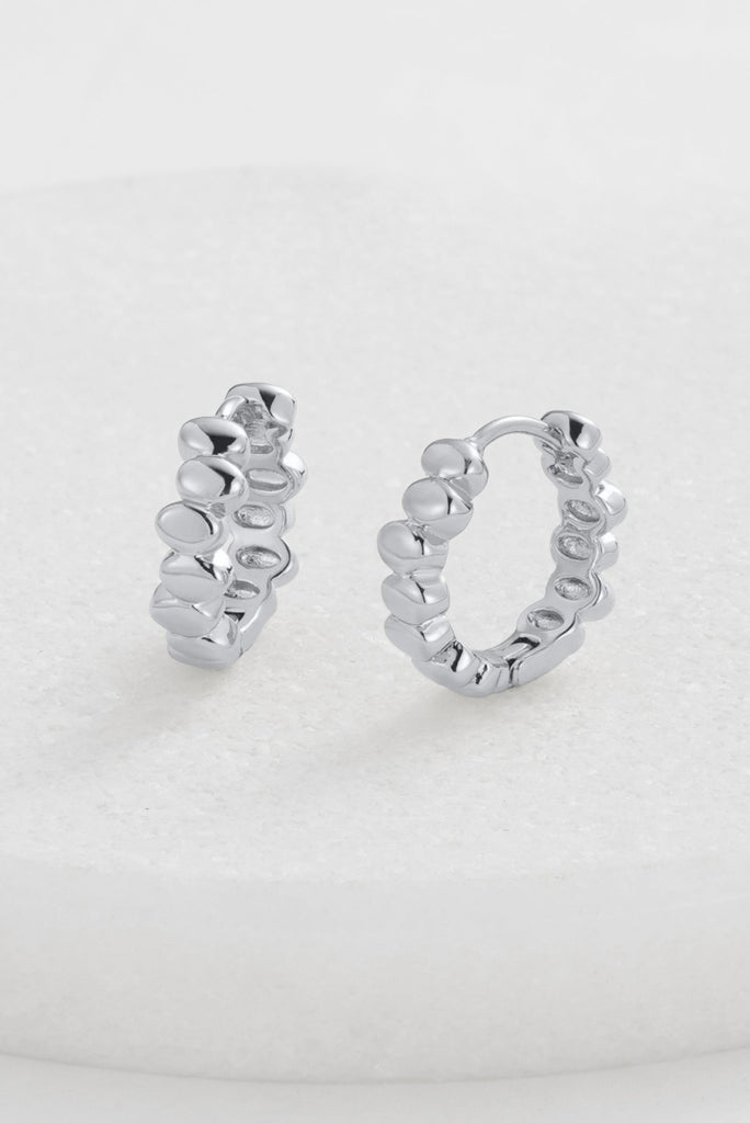 Bailey huggie - silver-Zafino-The Bailey Huggie is a sleek, plain metal hoop designed for effortless everyday wear. With its minimalist style and comfortable fit, it’s the perfect go-to piece for stacking or wearing on its own for a clean, polished look *Silver Plated Solid Brass Base *Splash Proof: Splashes or occasional water contact *4mm (w) x 12mm (L)-Pash + Evolve
