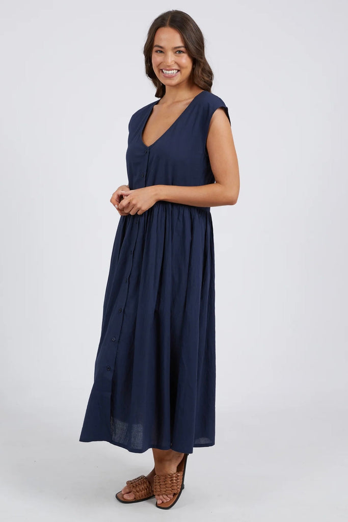 Blake Midi Dress - Dark Sapphire-Elm-Fresh & Light The Blake Midi Dress In Classic Navy Is A Must-Have For The Season. Featuring A Deep Vee Neckline And Gathered Waist At The Seam This Easy To Wear Dress Is Ideal For Work, Rest Or Play! Button Front Vee Neckline Gathered Waist at Seam Lightweight Cotton Model is 169cm and wears Size 10-Pash + Evolve