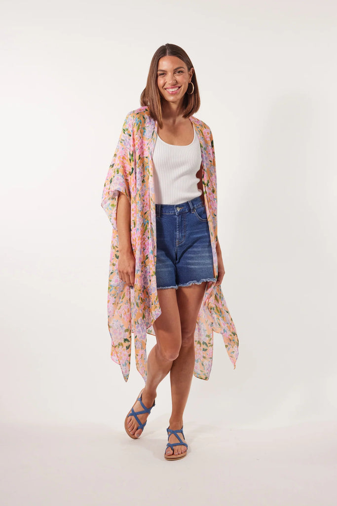 Botanical Cape - Sunset Hydrangea-Isle of Mine-The Botanical Cape is a must for your next summer vacation. You'll love the sheer lightness of this cape, especially on hot summer days when you don't want to wear anything too heavy. The open-style design and waterfall hem add a touch of sophistication that suits any occasion or location. Wear it over your swimsuit at the beach or lift a simple outfit for poolside drinks. FEATURES: Open style design 3/4 Length sleeves Waterfall hem Sheer and lightweight Side v
