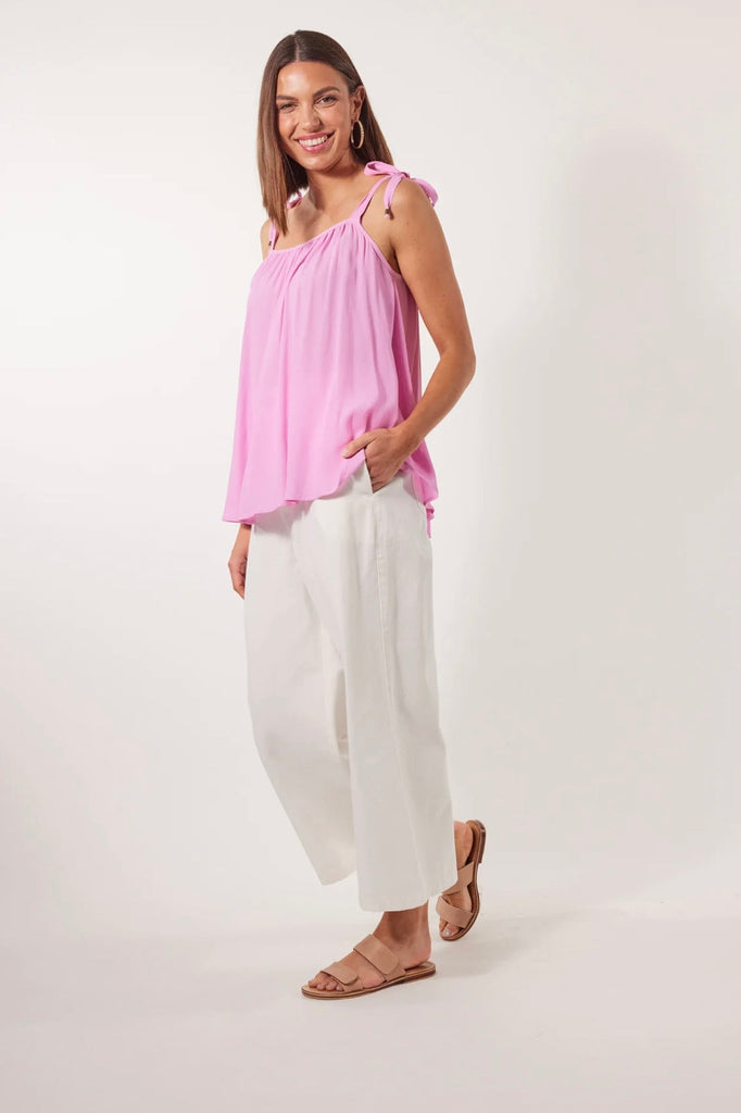 Botanical Tank - Peony-Isle of Mine-Stay cool and chic this summer with the Botanical Tank, featuring a square neck, delicate self-tie straps, and a flowing hem. The luxurious fabric adds a touch of sophistication, making it easy to dress up for any occasion. Pair it with a skirt, statement accessories, and a clutch for a perfect girls' night out ensemble. FEATURES: Square neck with gathering Self-tie straps Relaxed hem Easy fit Plain Material: 100% Viscose Print Material: 100% Rayon-Pash + Evolve