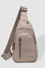 Boyd Nylon Sling Bag - Beige-Louenhide-The Louenhide Boyd Beige Nylon Sling Bag is an on-trend unisex sling bag designed with both style and functionality in mind. Organisation has never been easier with the three-section design, your valuables are within easy reach and secured safely with the stylish gunmetal zippers. Whether you're chasing an urban aesthetic or embodying an off-duty street style, this unisex nylon sling bag adapts to any casual outfit, enhancing your personal style while still offering ul