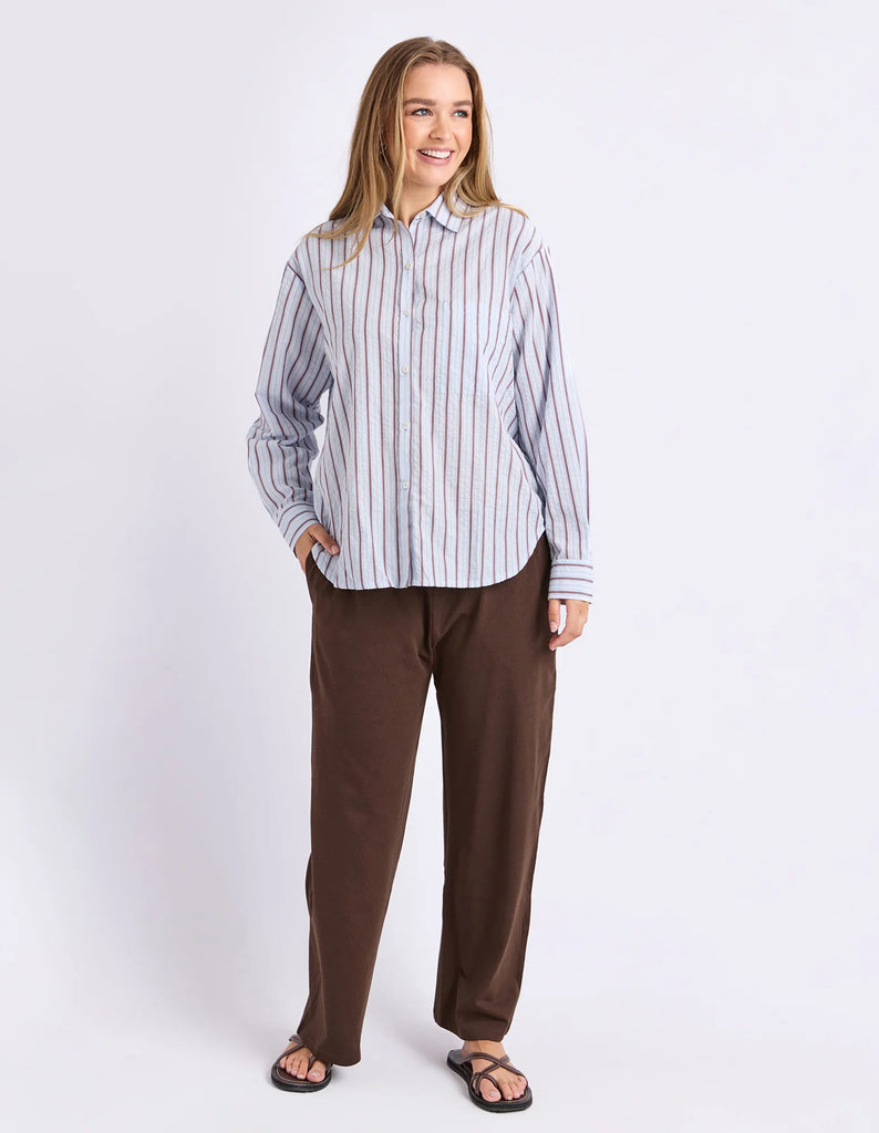 Breeze Shirt - Light Blue-Foxwood-Classic stripes with a relaxed feel. The Breeze Shirt is crafted from breathable cotton with yarn dyed stripes and an easy oversized silhouette. Finished with a front chest pocket and button through design, it's the kind of shirt you'll throw on over denim, shorts or wear open as a lightweight layer all season long. Yarn dyed stripe Front chest pocket Relaxed fit Model is wearing a size 10-Pash + Evolve