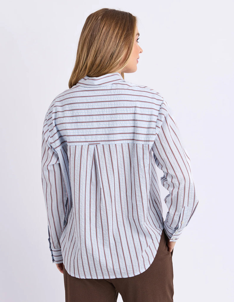 Breeze Shirt - Light Blue-Foxwood-Classic stripes with a relaxed feel. The Breeze Shirt is crafted from breathable cotton with yarn dyed stripes and an easy oversized silhouette. Finished with a front chest pocket and button through design, it's the kind of shirt you'll throw on over denim, shorts or wear open as a lightweight layer all season long. Yarn dyed stripe Front chest pocket Relaxed fit Model is wearing a size 10-Pash + Evolve