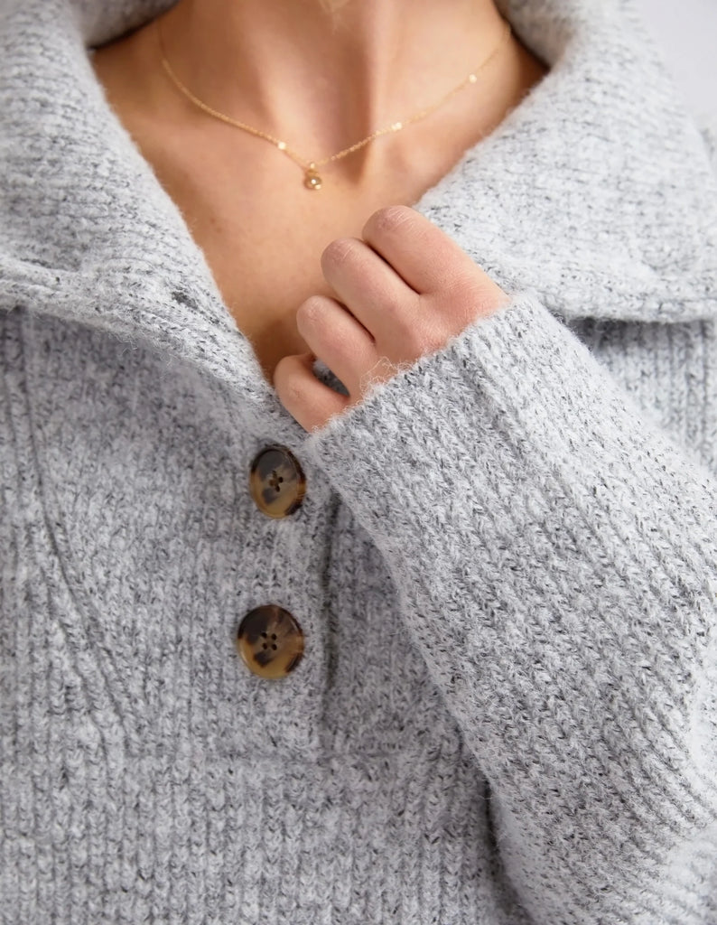Bron Button Knit - Grey Marle-Elm-Cosy comfort and style! The Bron Button Knit features a relaxed collar with chunky tortoiseshell buttons and is the ideal knit to complement your wardrobe through the cooler months. Traditional knitwear Collar and button placket Warm and cosy Acrylic Recycled Polyester Nylon Wool Elastane Model is wearing a size 10.-Pash + Evolve