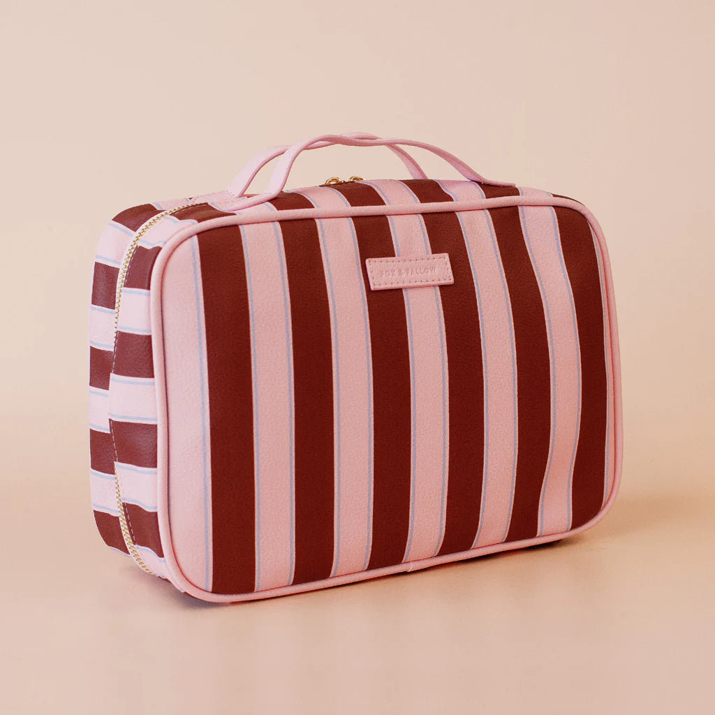 Burgundy Stripe Cosmetic Bag-Fox & Fallow-The bag of your dreams is here! With so many bonus features, you’ll be wondering where they’ve been all your life. The miracle pop out bag everyone’s been talking about. The ingenious removable clear bag is the true MVP here: it pops out of the main bag and it’s perfect for all your makeup & skincare essentials so you can find them easily through the clear plastic sides. Take it out and use it for your daily makeup & skincare routine or separately at airport securit