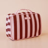 Burgundy Stripe Cosmetic Bag-Fox & Fallow-The bag of your dreams is here! With so many bonus features, you’ll be wondering where they’ve been all your life. The miracle pop out bag everyone’s been talking about. The ingenious removable clear bag is the true MVP here: it pops out of the main bag and it’s perfect for all your makeup & skincare essentials so you can find them easily through the clear plastic sides. Take it out and use it for your daily makeup & skincare routine or separately at airport securit