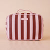 Burgundy Stripe Cosmetic Bag-Fox & Fallow-The bag of your dreams is here! With so many bonus features, you’ll be wondering where they’ve been all your life. The miracle pop out bag everyone’s been talking about. The ingenious removable clear bag is the true MVP here: it pops out of the main bag and it’s perfect for all your makeup & skincare essentials so you can find them easily through the clear plastic sides. Take it out and use it for your daily makeup & skincare routine or separately at airport securit