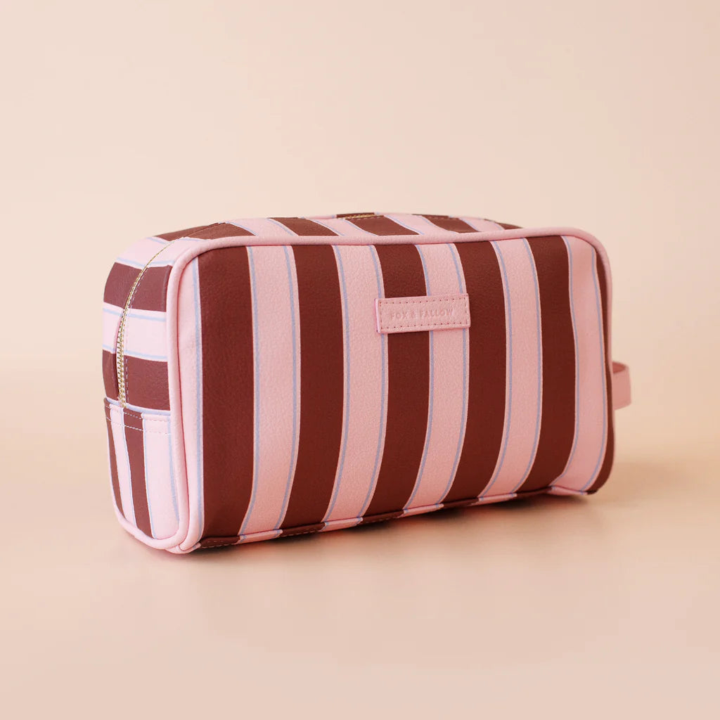 Burgundy Stripe Wash Bag-Fox & Fallow-The bag of your dreams is here! With so many bonus features, you’ll be wondering where they’ve been all your life. Beautiful, but practical. Perfect as an everyday make up bag or for all your bathroom essentials for the next work trip or vacay. Crafted from super soft, yet durable luxury pebble vegan leather it's easy to keep clean - simply wipe down with a damp cloth. The monogrammed tan lining is designed to hide make up or spills but also makes it easy to find all yo