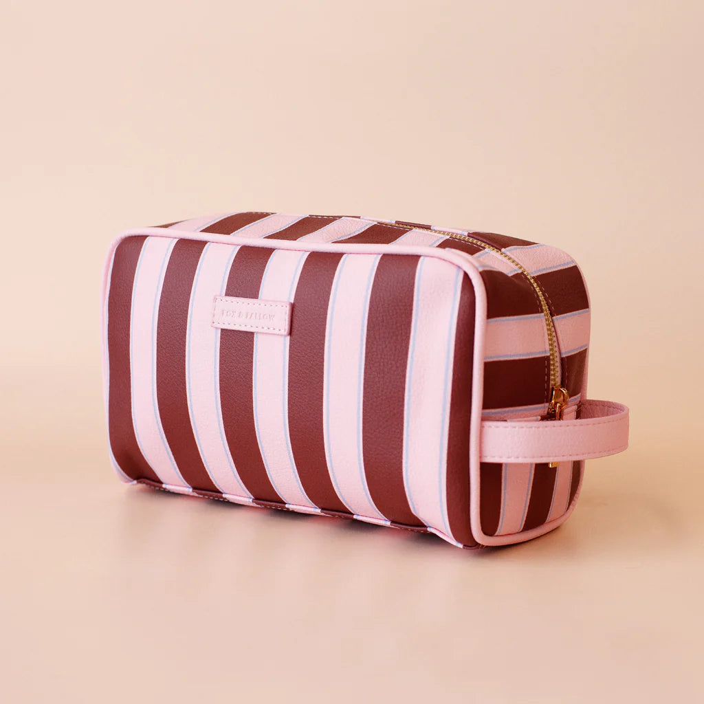 Burgundy Stripe Wash Bag-Fox & Fallow-The bag of your dreams is here! With so many bonus features, you’ll be wondering where they’ve been all your life. Beautiful, but practical. Perfect as an everyday make up bag or for all your bathroom essentials for the next work trip or vacay. Crafted from super soft, yet durable luxury pebble vegan leather it's easy to keep clean - simply wipe down with a damp cloth. The monogrammed tan lining is designed to hide make up or spills but also makes it easy to find all yo