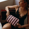 Burgundy Stripe Wash Bag-Fox & Fallow-The bag of your dreams is here! With so many bonus features, you’ll be wondering where they’ve been all your life. Beautiful, but practical. Perfect as an everyday make up bag or for all your bathroom essentials for the next work trip or vacay. Crafted from super soft, yet durable luxury pebble vegan leather it's easy to keep clean - simply wipe down with a damp cloth. The monogrammed tan lining is designed to hide make up or spills but also makes it easy to find all yo