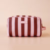 Burgundy Stripe Wash Bag-Fox & Fallow-The bag of your dreams is here! With so many bonus features, you’ll be wondering where they’ve been all your life. Beautiful, but practical. Perfect as an everyday make up bag or for all your bathroom essentials for the next work trip or vacay. Crafted from super soft, yet durable luxury pebble vegan leather it's easy to keep clean - simply wipe down with a damp cloth. The monogrammed tan lining is designed to hide make up or spills but also makes it easy to find all yo