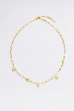 Charlotte Necklace - Pearl-Zarla-A refined chain detailed with soft pearls and delicate, shell-inspired charms. Light-catching and layered, it brings an effortless, ocean-inspired feel to your look. Feminine, elevated, and designed for easy everyday wear. *18K Gold Plated Solid Brass Base. *42cm + 5cm Extender *This piece is handmade and not recommended to be worn in water-Pash + Evolve