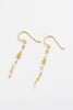 Charlotte Thread Earring - Pearl-Zarla-A delicate thread earring adorned with soft pearls and sculpted accents. Light and fluid in design, it moves effortlessly with you, catching the light with a subtle, sunlit glow. Feminine, refined, and perfect for elevating everyday wear. *18K Gold Plated Solid Brass Base *This piece is handmade and not recommended to be worn in water-Pash + Evolve