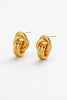 Clara earring - Gold-Zafino-The Clara Earring is a bold statement stud featuring an intricate woven knot design with a high-shine gold finish. Sculptural and eye-catching, this piece brings texture and dimension to your look while maintaining a timeless, elevated feel. Perfect for both everyday styling and special occasions, Clara adds a confident, polished touch to any jewellery collection. Metal: 18K gold plated on brass baseDimensions: 18mm length + 11.5mm widthWaterproof: Designed for daily wear, includ