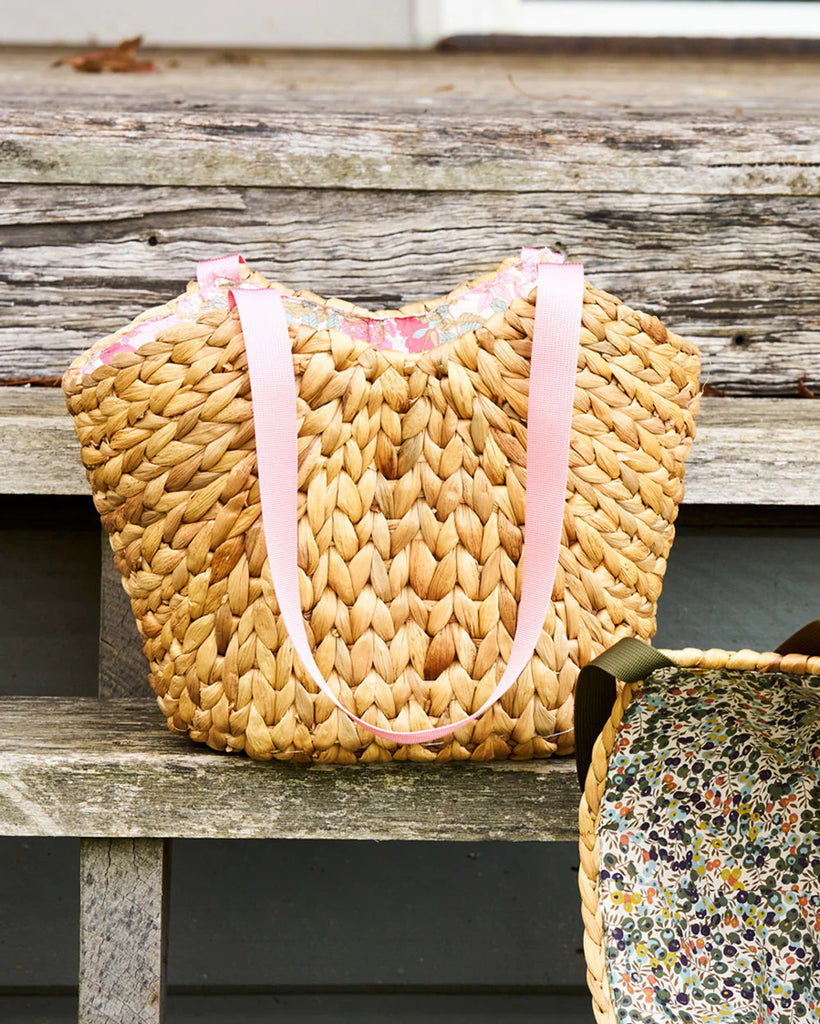 Clarabell Basket-Pash + Evolve-A considered collaboration between Robert Gordon and historic British brand Liberty London. These handwoven baskets are lined with signature Liberty floral fabric, perfect for storing textiles, filling with groceries, or taking to a picnic. Hand woven water hyacinth Lined with beautiful Liberty London floral fabric Coloured canvas handles 38 x 20 x 21cm Designed in Australia-Pash + Evolve