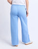 Classic Track Pant - Blue-Foxwood-Comfort? Tick. Style? Double tick. Our Classic Track Pant is here to level up your lounge game. With an easy elastic waist, playful leg embroidery, and a straight-leg cut that feels as good as it looks—these pants are made for slow mornings and stylish strolls. Bonus points for the hem splits and pockets (because everything's better with pockets). Elastic waist Hem splits Leg embroidery 100% Cotton Our model is 176cm and wears Size 10-Pash + Evolve