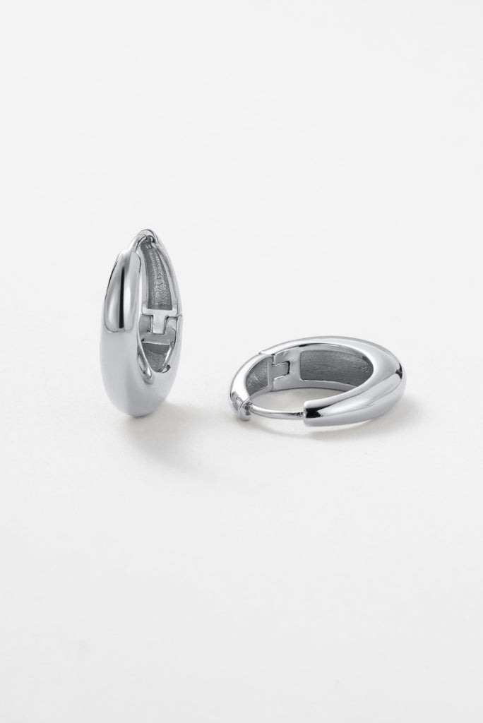 Cleo hoop medium - silver-Zafino-The Cleo Medium Hoop in silver is the ideal middle ground, polished enough to elevate your daily look, yet easy enough for casual styling. With its effortless versatility, this lightweight design is an upgrade from our much-loved Kendall Hoop, delivering timeless style you'll wear on repeat. Silver Plated Solid Brass Base 6mm (w) x 21mm (L) Splash Proof: Splashes or occasional water contact-Pash + Evolve
