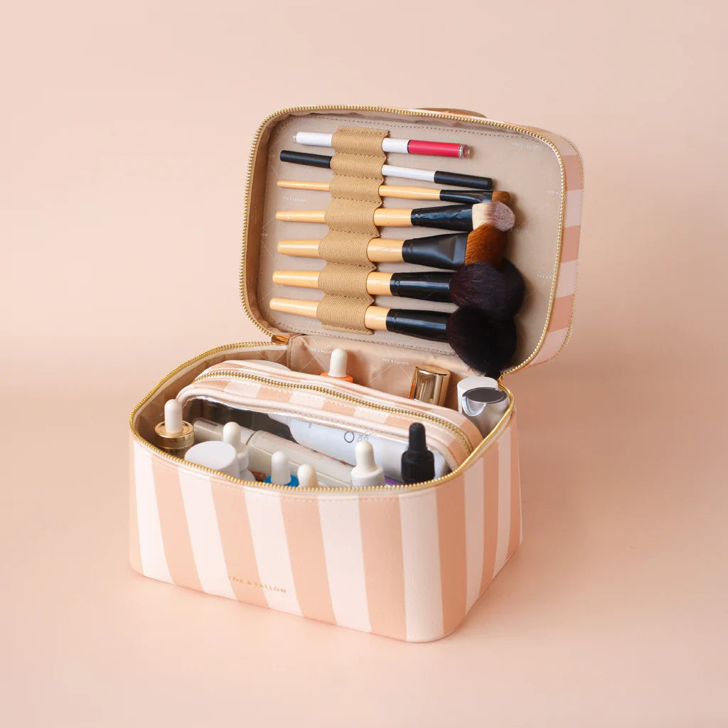 Corsica Vanity Case-Fox & Fallow-Say hello to your new bestie - the Fox & Fallow 'Classic' Vanity Case! She’ll get you organised and keep you organised, whipping your skincare and makeup routine into shape. Not just for travel, it's the perfect bag for everyday! • Vanity Case: 24 x 16.5 x 17.5cm.• Box: 26 x 20 x 20cm.• Pebble vegan leather with a tan lining.• Dual layer with elastic loops.• Internal zip pocket.• Gold hardware.• Two handles and two zippers for easy access.• Bonus removable clear bag.• Max. w