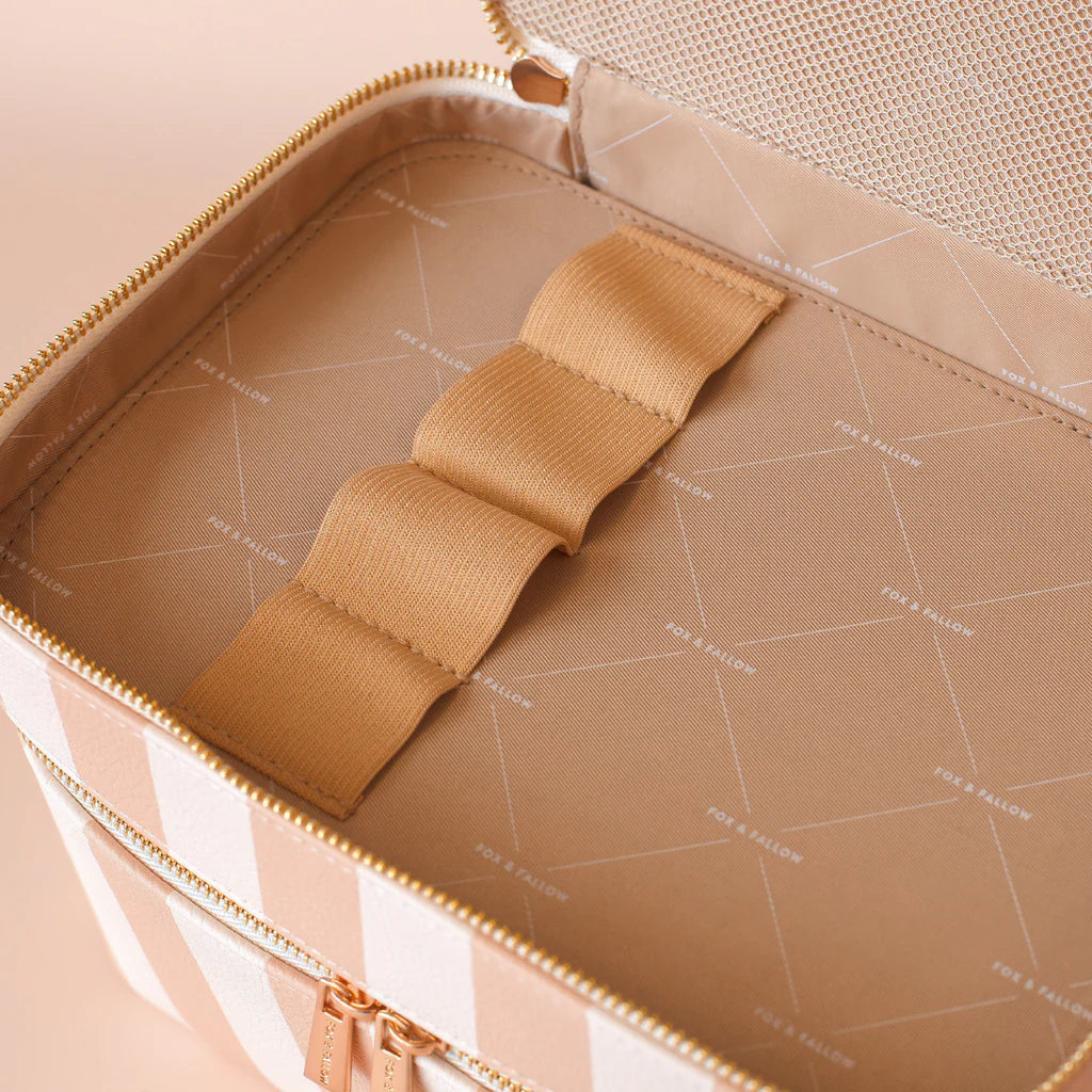 Corsica Vanity Case-Fox & Fallow-Say hello to your new bestie - the Fox & Fallow 'Classic' Vanity Case! She’ll get you organised and keep you organised, whipping your skincare and makeup routine into shape. Not just for travel, it's the perfect bag for everyday! • Vanity Case: 24 x 16.5 x 17.5cm.• Box: 26 x 20 x 20cm.• Pebble vegan leather with a tan lining.• Dual layer with elastic loops.• Internal zip pocket.• Gold hardware.• Two handles and two zippers for easy access.• Bonus removable clear bag.• Max. w