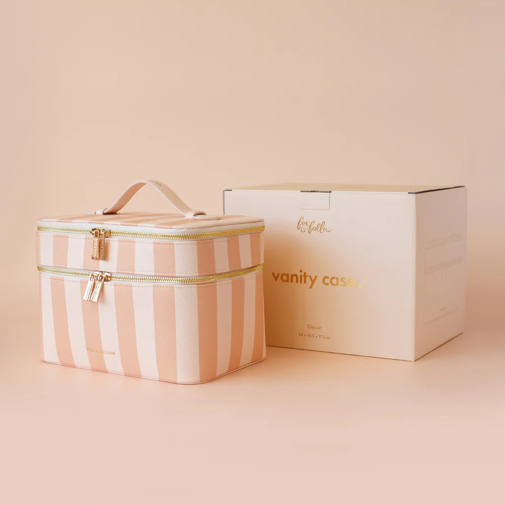 Corsica Vanity Case-Fox & Fallow-Say hello to your new bestie - the Fox & Fallow 'Classic' Vanity Case! She’ll get you organised and keep you organised, whipping your skincare and makeup routine into shape. Not just for travel, it's the perfect bag for everyday! • Vanity Case: 24 x 16.5 x 17.5cm.• Box: 26 x 20 x 20cm.• Pebble vegan leather with a tan lining.• Dual layer with elastic loops.• Internal zip pocket.• Gold hardware.• Two handles and two zippers for easy access.• Bonus removable clear bag.• Max. w