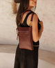 Cressida crossbody bag - bergundy-Louenhide-The Louenhide Cressida Burgundy Crossbody Bag is your go-to for everyday ease and streamlined functionality. Designed in rich, seasonal hues, this burgundy crossbody handbag is both timeless and practical. The structured silhouette offers a spacious interior to keep your daily essentials organised, while the secure zip closures ensure everything stays in place. Whether worn over the shoulder or across the body, the adjustable strap lets you tailor the fit to suit 
