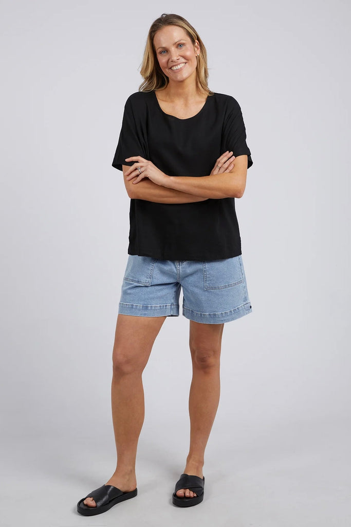 Curtis Woven Tee - Black-Elm-This Curtis Woven Tee is a must-have basic for any wardrobe. It offers a comfortable and versatile fit. Perfect for everyday wear, it is a timeless piece that can be dressed up or down for any occasion. Regular fit Cotton Model is wearing a size 10.-Pash + Evolve