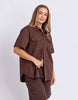 Daisy Short Sleeve Shirt - Chocolate-Foxwood-Your favourite denim shirt just got cooler with short sleeves. Featuring a button-through placket, front chest pockets, and a relaxed fit, the Daisy SS Shirt is perfect for easygoing days with laid-back style. Button through placket Front chest pockets Relaxed fit Model is wearing a size 10-Pash + Evolve