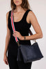 Daisy Stripe Crossbody Bag - Navy-Louenhide-The Louenhide Daisy Navy Crossbody Bag with Stripe Strap is a gorgeously soft and slouchy bag; it's a best-selling style for a reason! Full of functionality, secure your essentials in two slip pockets, one zip pocket, and a backside zip pocket. Complete with a new sporty adjustable and detachable webbing strap and fun tassel, the Daisy Navy Stripe is a relaxed and understated style that will be a staple for seasons to come. If the Daisy Navy Crossbody Bag is too b