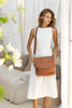 Darcy bag - Vintage tan-Baleka Leather-Your perfect everyday companion! With a spacious silhouette that doesn’t compromise on style. This bag features a secure zip closure, a handy back zip pocket and a front pocket for quick access to your essentials. Inside you will find a zip pocket and an additional internal pocket, all beautifully lined to keep your items organized and protected. The adjustable strap ensures a comfortable fit, whether worn on the shoulder or crossbody. The Darcy is your new go to - re
