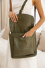 Darcy bag - olive green-Baleka Leather-Your perfect everyday companion! With a spacious silhouette that doesn’t compromise on style. This bag features a secure zip closure, a handy back zip pocket and a front pocket for quick access to your essentials. Inside you will find a zip pocket and an additional internal pocket, all beautifully lined to keep your items organized and protected. The adjustable strap ensures a comfortable fit, whether worn on the shoulder or crossbody. The Darcy is your new go to - re