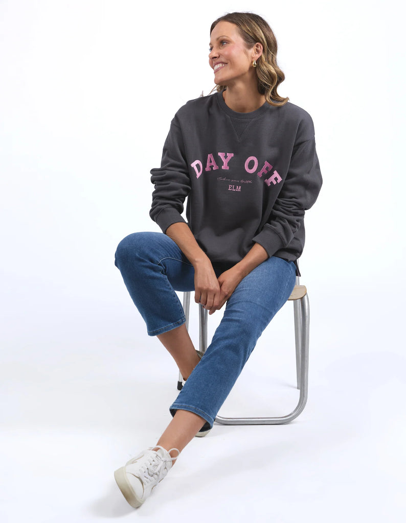 Day off crew - washed black-Elm-Go on ... you deserve a Day Off! Our stylish 100% cotton crew gives you license to not only look casually cool, but also to have the day off you deserve. So treat yourself to a day off! Large front embroidery Oversized comfort fit Badge detail Unbrushed Cotton Fleece Model is wearing a size 10-Pash + Evolve