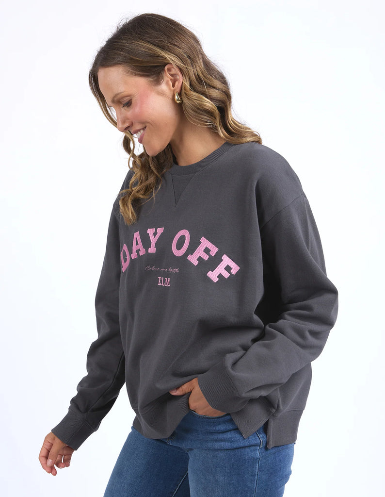 Day off crew - washed black-Elm-Go on ... you deserve a Day Off! Our stylish 100% cotton crew gives you license to not only look casually cool, but also to have the day off you deserve. So treat yourself to a day off! Large front embroidery Oversized comfort fit Badge detail Unbrushed Cotton Fleece Model is wearing a size 10-Pash + Evolve