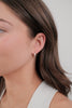 ELOISE HOOP - SILVER-Zafino-The Eloise Hoop is a small, dainty hoop designed with a subtle twisted detail for a modern yet timeless look. Lightweight and versatile, it’s the perfect everyday earring—easy to style solo for minimal elegance or layered with larger hoops and studs for a chic stacked effect. Metal: Silver Plated on BrassDimensions: 4mm x 11mmWater Resistant: Splash proof, not recommended to be worn in the ocean or pool-Pash + Evolve