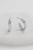 ELOISE HOOP - SILVER-Zafino-The Eloise Hoop is a small, dainty hoop designed with a subtle twisted detail for a modern yet timeless look. Lightweight and versatile, it’s the perfect everyday earring—easy to style solo for minimal elegance or layered with larger hoops and studs for a chic stacked effect. Metal: Silver Plated on BrassDimensions: 4mm x 11mmWater Resistant: Splash proof, not recommended to be worn in the ocean or pool-Pash + Evolve