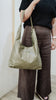 Eden shoulder bag - Olive Green-Baleka Leather-Elevate your everyday with the Eden shoulder bag, featuring a relaxed, slouchy silhouette with effortless style. Designed for practicality, it offers a secure press stud closure, fully lined interior, complete with an internal zip and pocket to keep your essentials organised. Comfortable and chic, the Eden shoulder bag is made to move with you - effortlessly adapting your day with understated style. An elegant bag designed in the beautiful town of Port Fairy S