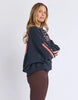 Elevated Sunday Crew - Navy/orange-Foxwood-Designed for off-duty comfort with a polished edge, the Elevated Sunday Crew brings something a little extra to your everyday layers. Featuring velour artwork across the chest and sleeves, it adds texture and depth while still keeping things understated. The soft round neckline and relaxed, boxy fit make it easy to wear, while the luxe detailing gives it a more considered feel. Front chest and sleeve velour artwork Round neckline Relaxed boxy fit 100% Cotton Our m