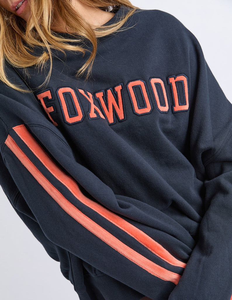 Elevated Sunday Crew - Navy/orange-Foxwood-Designed for off-duty comfort with a polished edge, the Elevated Sunday Crew brings something a little extra to your everyday layers. Featuring velour artwork across the chest and sleeves, it adds texture and depth while still keeping things understated. The soft round neckline and relaxed, boxy fit make it easy to wear, while the luxe detailing gives it a more considered feel. Front chest and sleeve velour artwork Round neckline Relaxed boxy fit 100% Cotton Our m