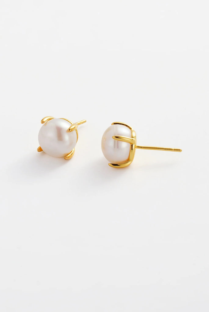 Elise Pearl Stud-Zafino-The Elise Pearl Stud Earrings are a timeless essential, designed to bring effortless elegance to everyday styling. Featuring luminous freshwater pearls set in delicate gold prongs, these classic pearl studs highlight the natural beauty and softness of each pearl. Perfect for daily wear, bridal styling and minimalist layering, Elise offers a refined finish that pairs seamlessly with both statement pieces and simple gold jewellery. A modern take on a jewellery classic, these freshwater