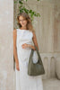 Elle shoulder bag - Olive green-Baleka Leather-Timelessly stylish, Elle is your go to for days that flow from brunch to evening drinks with the girls. With a sleek, minimal silhouette that fits comfortably under the arm, it's the perfect blend of style and ease. Featuring a secure button closure, internal zip, slip pocket and a fully lined interior, the Elle bag carries your essentials with refined simplicity. Understated, modern and ready for wherever the day takes you! A stylish bag designed in the beaut