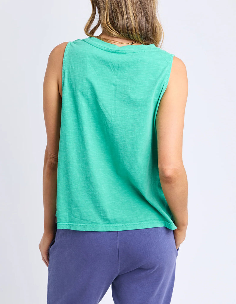 Elysian tank - gumdrop green-Elm-The Elysian Tank features a sleek button placket on the front for adjustable styling and added detail. Woven tape along the side seams enhances the tank's structure, creating a polished look while maintaining comfort. This versatile piece effortlessly elevates casual and layered outfits alike. Button placket Wide straps for bra coverage Woven tape down side seams 100% Cotton Slub Jersey Model is 171cm and wears Size 10-Pash + Evolve