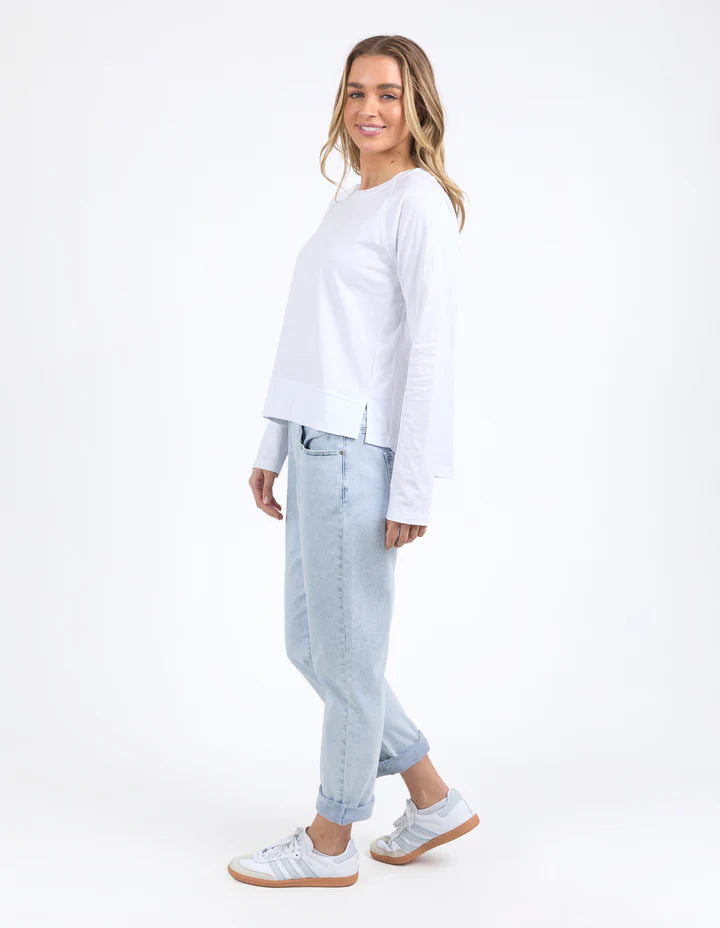Endless Long Sleeve Tee - White-Foxwood-The Endless Long Sleeve features a classic design with a side split hem and lightweight feel. Its crew neck and clean finish make it a comfortable choice for everyday wear. Round neckline Raglan sleeve Side seam splits 100% Cotton Our model is 176cm and wears Size 10-Pash + Evolve