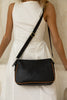Esme bag - Black/tan trim-Baleka Leather-With its seamless silhouette and elevated simplicity, Esme is designed to keep up with your pace - from morning meetings to evening plans. A contrast trim adds subtle detail, while the adjustable strap allows for easy wear - over the shoulder or crossbody. Thoughtfully finished with a fully lined interior, internal zip and slip pocket, keeping your essentials organised. The perfect, modern style for everyday use. A modern style designed in the beautiful town of Port
