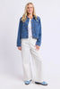 Essie Denim Jacket - Mid Blue Wash-Elm-The Essie Denim Jacket is a fresh take on a classic layer. Designed with a cropped length, relaxed fit and chest patch pockets, it adds just the right amount of structure to everyday outfits. Throw it over a tee dress, pair it with wide-leg pants or wear it with contrasting denim for an easy double-denim moment. Chest patch pockets Cropped length Rigid denim Relaxed fit 100% cotton denim The Model is 173cm and is wearing a size 10-Pash + Evolve