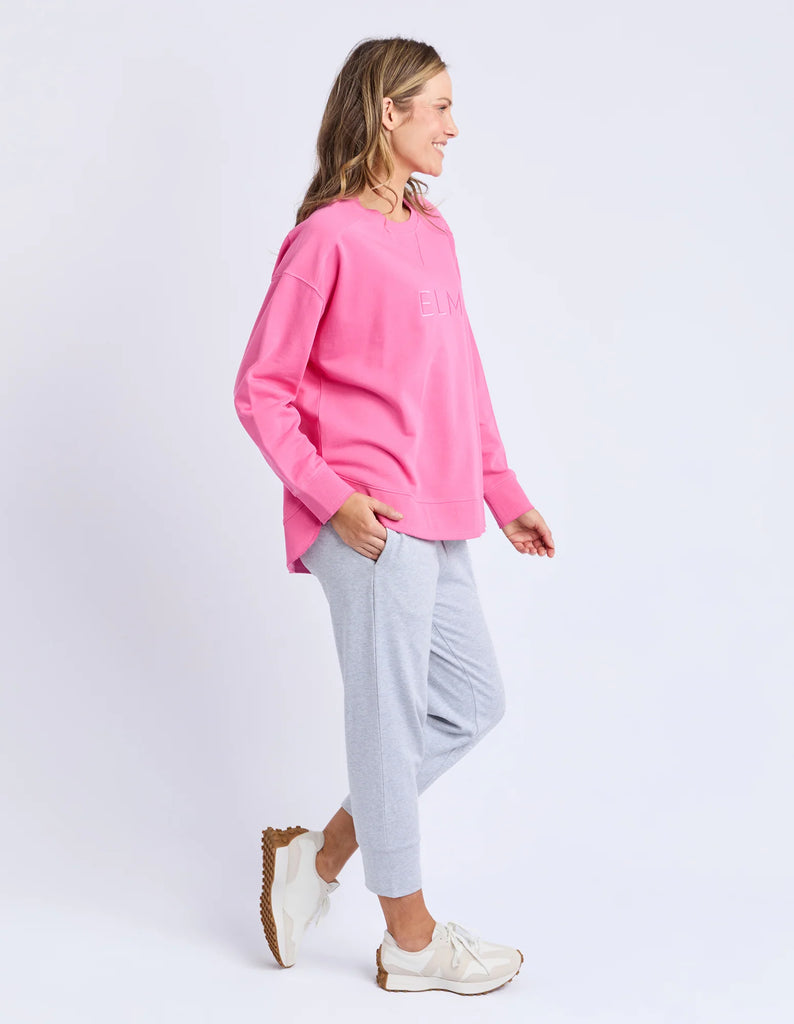 Established crew - aurora pink-Elm-Guaranteed to be your new favourite crew. The Established Crew features raw seam detail and cute Elm embroidery making it an effortless choice for both comfort and style. Raw Seams Elm Embroidery Crew Neckline Unbrushed Cotton Fleece 100% Cotton Model is 171cm and wears Size 10-Pash + Evolve