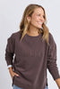 Established crew - coffee-Elm-Guaranteed to be your new favourite crew. The Established Crew features raw seam detail and cute Elm embroidery making it an effortless choice for both comfort and style. Raw hem detail Chest embroidery Scooped hemline Relaxed fit 100% cotton unbrushed fleece Model is wearing a size 10-Pash + Evolve