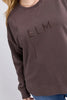 Established crew - coffee-Elm-Guaranteed to be your new favourite crew. The Established Crew features raw seam detail and cute Elm embroidery making it an effortless choice for both comfort and style. Raw hem detail Chest embroidery Scooped hemline Relaxed fit 100% cotton unbrushed fleece Model is wearing a size 10-Pash + Evolve