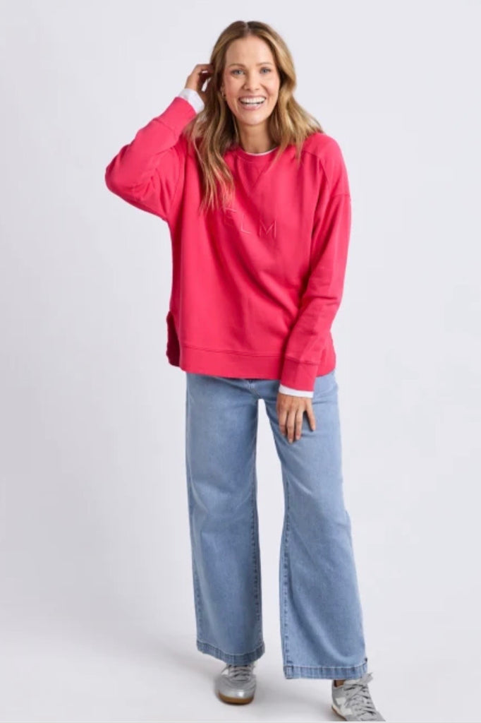 Established crew - dark pink-Elm-Guaranteed to be your new favourite crew. The Established Crew features raw seam detail and cute Elm embroidery making it an effortless choice for both comfort and style. Raw hem detail Chest embroidery Scooped hemline Relaxed fit 100% cotton unbrushed fleece Model is wearing a size 10-Pash + Evolve