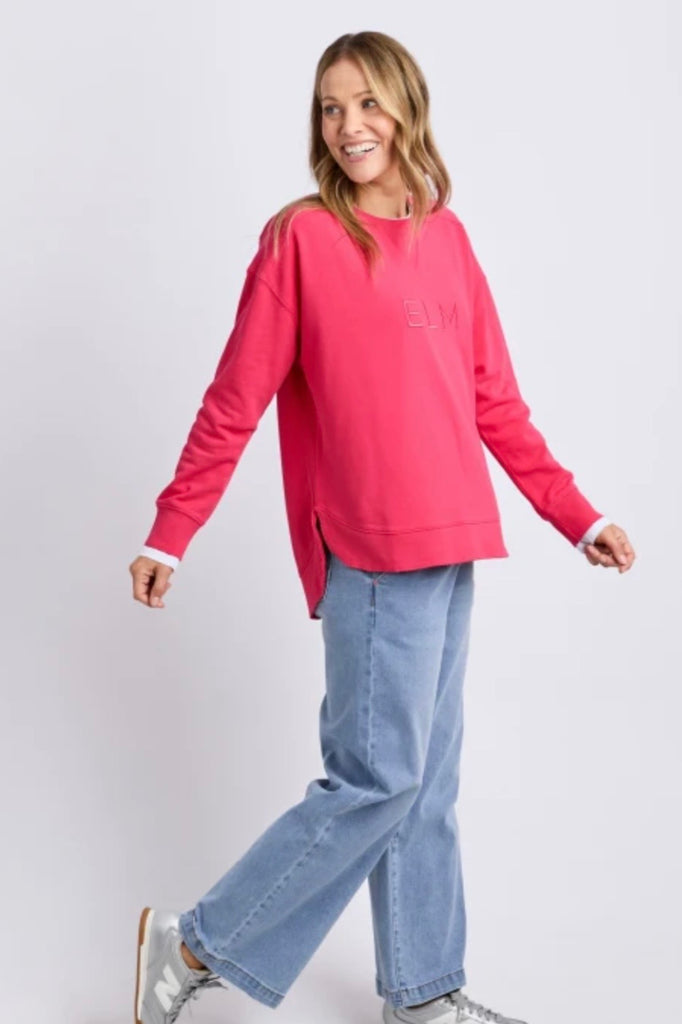 Established crew - dark pink-Elm-Guaranteed to be your new favourite crew. The Established Crew features raw seam detail and cute Elm embroidery making it an effortless choice for both comfort and style. Raw hem detail Chest embroidery Scooped hemline Relaxed fit 100% cotton unbrushed fleece Model is wearing a size 10-Pash + Evolve